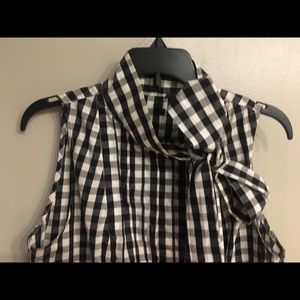 Beautiful elegant top with a bow tie.